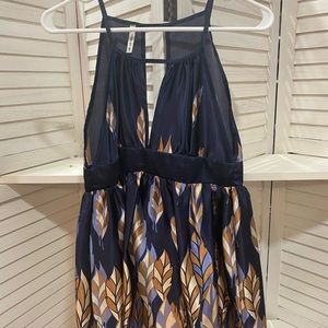 Satin like long shirt with back tie, pretty leaf print